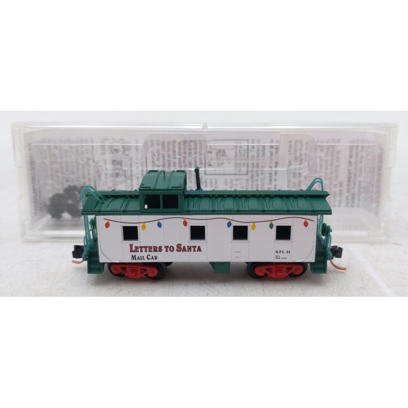Micro-Trains 100230 N North Pole Central 36′ Riveted Steel Caboose LN/Box